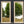 two tall mirrors standing side-by-side against a grey door. The frames are finished in an aged cracked gesso with antique gold detailing and the mirror has a bevel along the outside and is reflecting the East Sussex countryside.