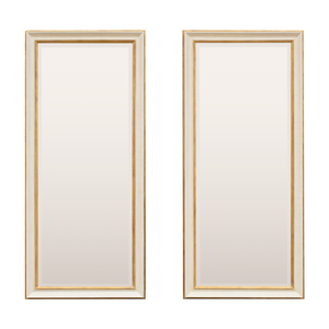 Two traditional style mirrors. The frames are made using an aged cracked gesso and antique gold, while the glass has a bevel that runs along the outside edge. 