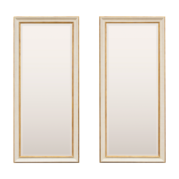 Two traditional style mirrors. The frames are made using an aged cracked gesso and antique gold, while the glass has a bevel that runs along the outside edge. 