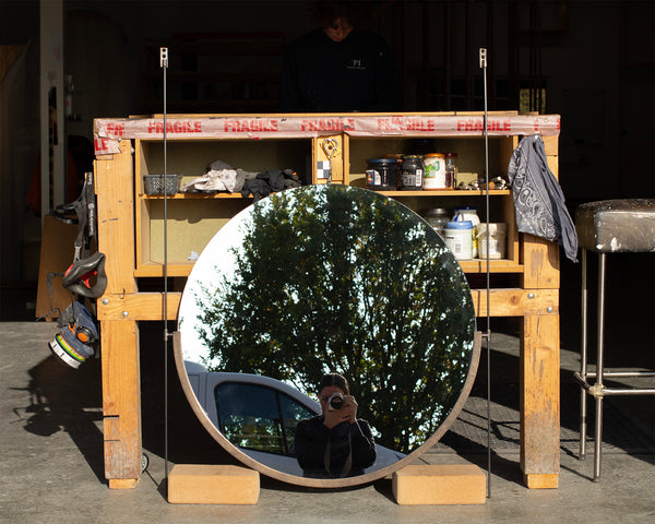 Dark Bronze Pitted Round Mirror with Poles