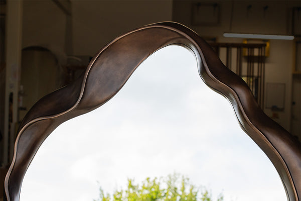 Hand-Carved Shaped Mirror in Bronze