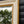 Corner detail of a bevelled mirror framed using an aged cracked gesso finish with antique gold detailing. 
