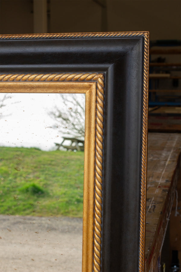 Distressed and Lightly Textured Black and Gold Mirror